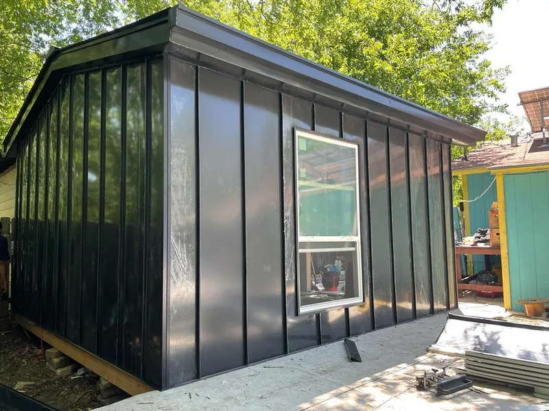 Black standing seam metal wall panels for Roof Inspection in Marlborough